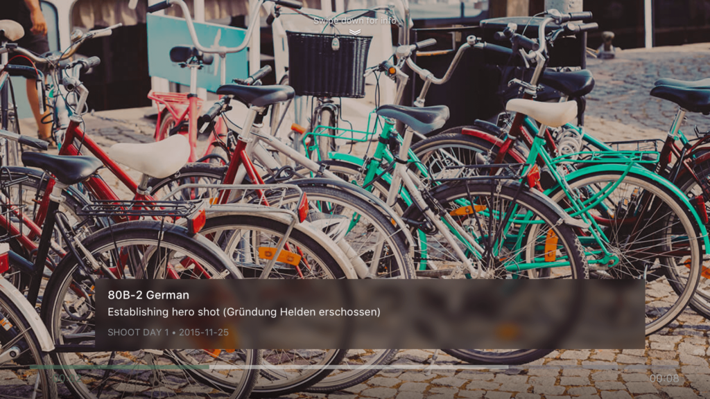 A screenshot of the tvOs version of the UI/UX project. The screenshot shows bicycles and an overlay with the metadata of the film shoot day.